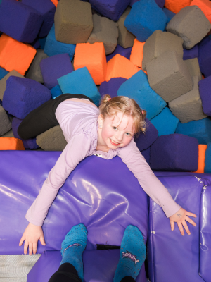 kid in foam pit at Altitude