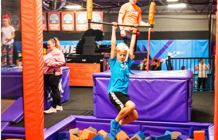 trapeze swing attraction at Altitude Trampoline Park