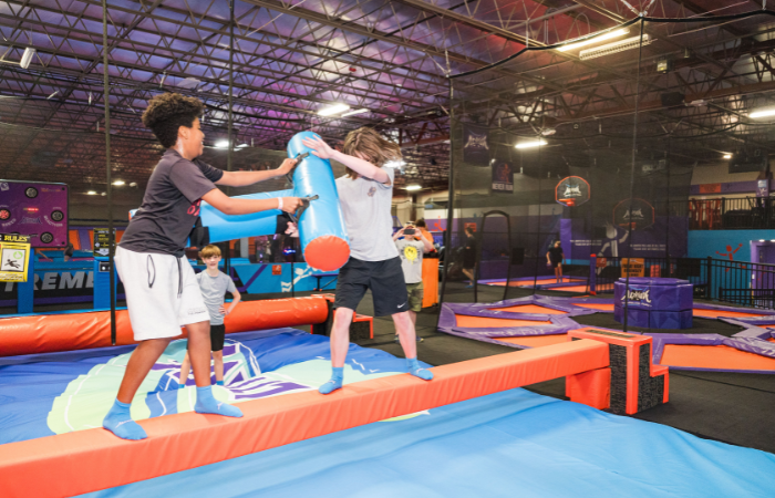 battle beam at Altitude Trampoline Park in Bloomington, IL