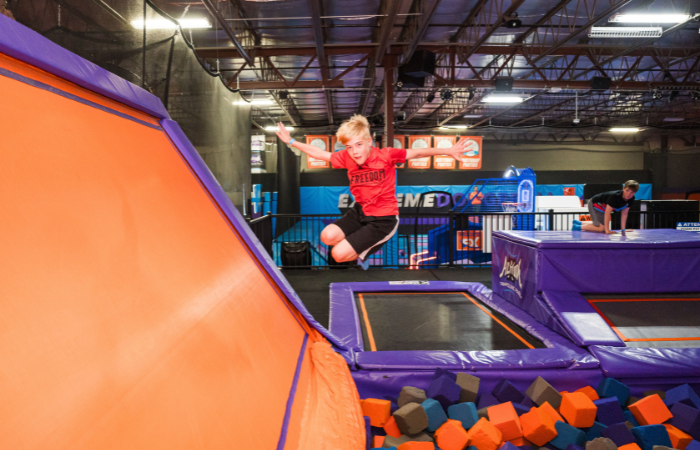 come and jump into the foam pit at Altitude Trampoline Park in Bloomington, IL