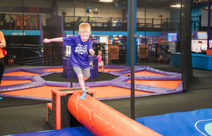 beat your best time across the log roll at Altitude Trampoline Park in Bloomington, IL
